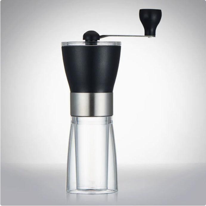 Manual coffee grinder with glass jar and hand crank