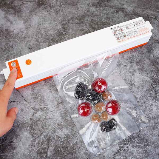 Mini rechargeable vacuum sealer sealing food in clear vacuum bag with one-touch button portable food preservation device