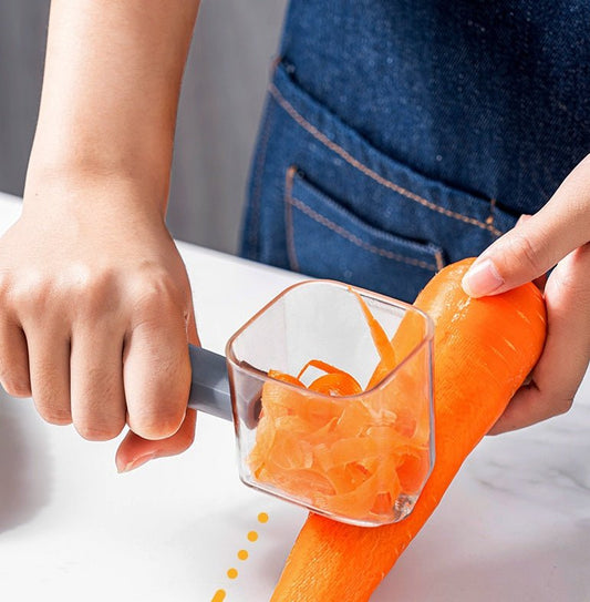 Handheld vegetable peeler with built-in container peeling carrot