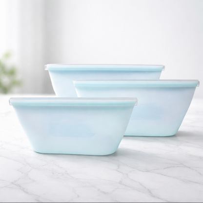 Eco-friendly silicone food storage bags for refrigerator and meal prep on wooden counter